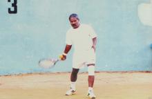 A tennis match in progress at the 12th Inter-IIT Staff Sports Meet, 2004