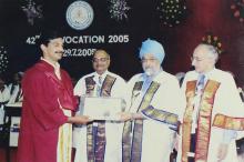 A student receives a degree at the 42nd Convocation (2005)