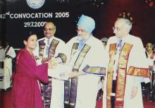 A student receives a degree at the 42nd Convocation, 2005