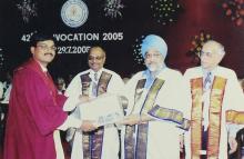 A student receives a degree at the 42nd Convocation, 2005