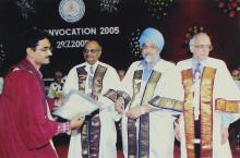 A student receives a degree at the 42nd Convocation, 2005