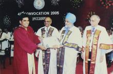 A student poses for a photograph at the 42nd Convocation, 2005