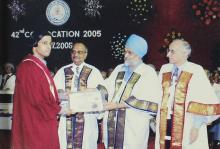 A student receives a degree at the 42nd Convocation, 2005