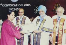 A student receives a degree at the 42nd Convocation, 2005