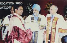 A student poses for a photograph at the 42nd Convocation, 2005