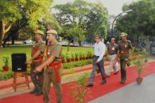 Director Bhaskar Ramamurthi is escorted by Registrar A. Thirunavukkarasu and SFO Narayan Elumalai