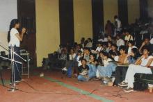 A student performs a vocal number (possibly) at a Saarang 2000 event