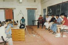 An event that appears to be a quiz/debate takes place in a classroom at Saarang 2000