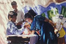 Students participate in an arm wrestling competition at Saarang 2000