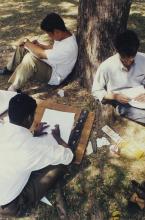 Students participating in an art competition at Saarang 2000 are seen working on an art pieces