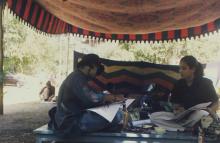 Students participating in an art competition at Saarang 2000 are seen working on art pieces