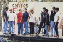 A group of students performing at an outdoor music event at the Saarang 2000 cultural festival