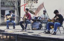A group of students performing at an outdoor music event at the Saarang 2000 cultural festival