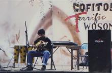 A student performs at an outdoor music event at the Saarang 2000 cultural festival
