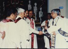 Dr. Gururaj Deshpande shakes hands with faculty members at the Special Convocation (2001)