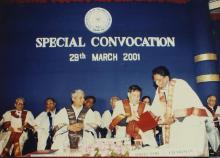 Dr. R. Natarajan signs in the Autograph book, special convocation (2001)