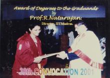 Prof. R. Natarajan congratulates a student who was awarded a degree during the 38th Convocation (2001)