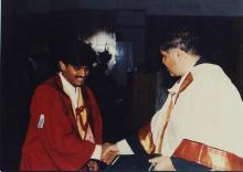 Prof. R. Natarajan shakes hands with a graduating student at the 38th Convocation, 2001