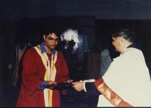 A student receives a degree at the 38th Convocation, 2001