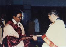 A student receives a degree at the 38th Convocation, 2001