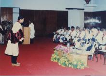 A student bows during the degree distribution, 38th Convocation (2001)