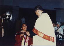 A student receives a degree from Prof. R. Natarajan at the 38th Convocation, 2001