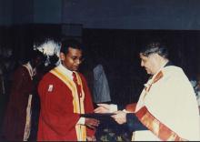 Prof. R. Natarajan congratulates a student who was awarded a degree during the 38th Convocation (2001)