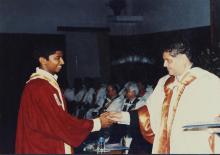 Prof. R. Natarajan congratulates a student who was awarded a degree during the 38th Convocation (2001)