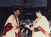 A student receives a degree at the 38th Convocation, 2001