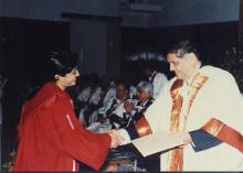 Prof. R. Natarajan congratulates a student who was awarded a degree during the 38th Convocation (2001)