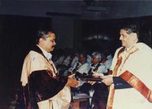 A student receives a degree at the 38th Convocation, 2001