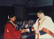 Prof. R. Natarajan congratulates a student who was awarded a degree during the 38th Convocation (2001)