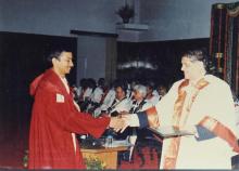 Prof. R. Natarajan congratulates a student who was awarded a degree during the 38th Convocation (2001)