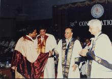 A student is congratulated by Mr. Krishnaswamy Kasturirangan at the 38th Convocation (2001)