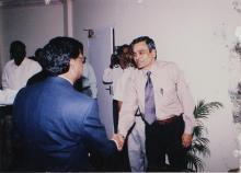 Dr. K. Anji Reddy shakes hands with a person at the 39th Convocation, 2002