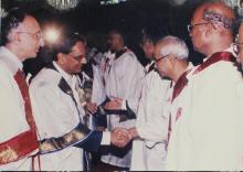 Dr. K. Anji Reddy shakes hands with a faculty member at the 39th Convocation, 2002