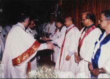 Prof. M. S. Ananth and Dr. K. Anji Reddy shake hands with faculty members at the 39th Convocation, 2002
