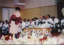 A student bows before receiving their degree certificate at the 39th Convocation, 2002
