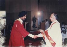 Prof. M. S. Ananth congratulates a graduating student at the 39th Convocation, 2002