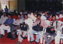 A photograph of some of the official photographers for the 39th Convocation, 2002