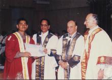 A prize winning student poses for a photograph with the distinguished guests at the 39th Convocation, 2002