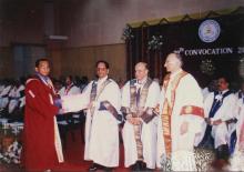 Posing for a photograph during the awards ceremony, 39th Convocation (2002)