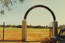 The entrance arch of the IIT Madras Chemplast Cricket Ground stating its name